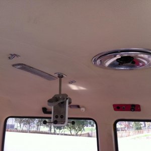 Removable IV pole, operational vent fan, fluorescent light, driver buzzer, power socket, and light control.